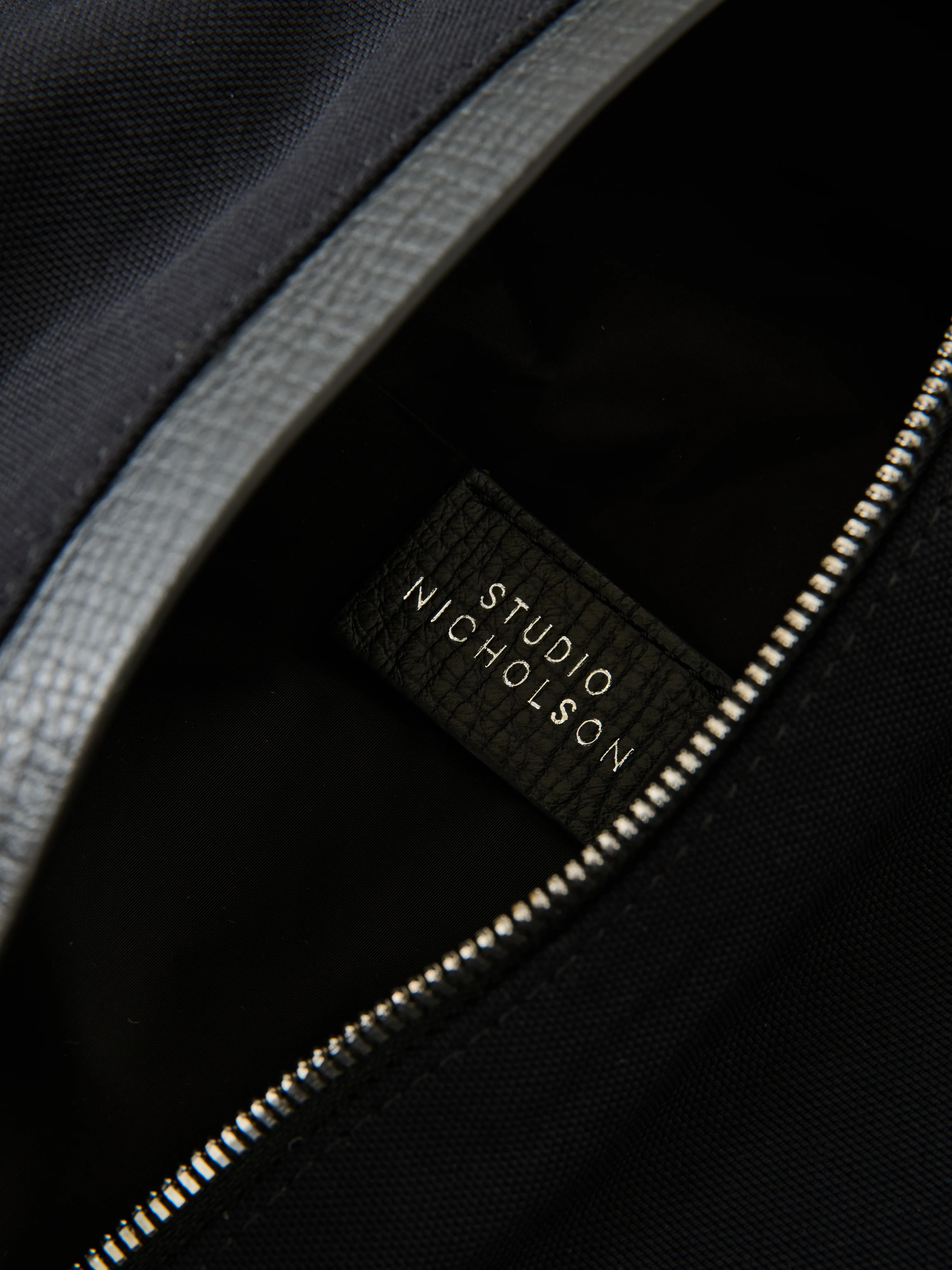 Cross Duffle Bag in Black - Image 9
